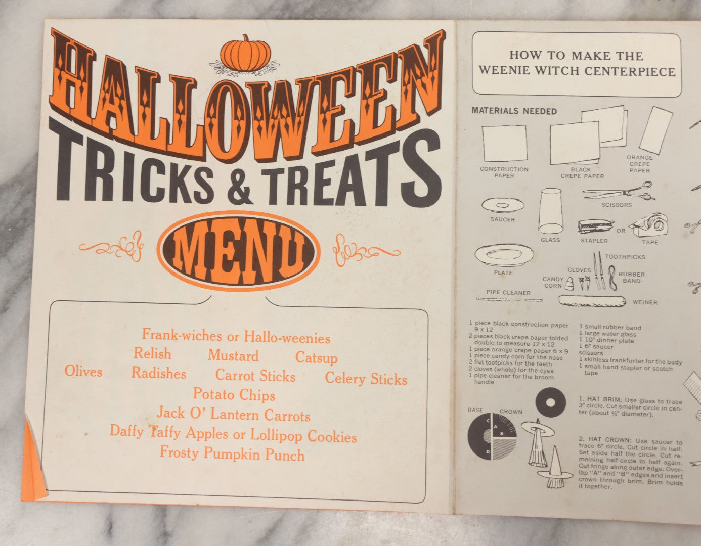 Lot 068 - Vintage "Franks Weeny Witch Hallowe'en Party Merry Makings" Fold Out Pin-The-Broom-On-The-Witch Poster And Halloween Party "Tricks And Treats Menu" With Recipes Including Brooms By Nepco