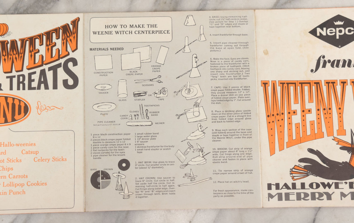 Lot 068 - Vintage "Franks Weeny Witch Hallowe'en Party Merry Makings" Fold Out Pin-The-Broom-On-The-Witch Poster And Halloween Party "Tricks And Treats Menu" With Recipes Including Brooms By Nepco