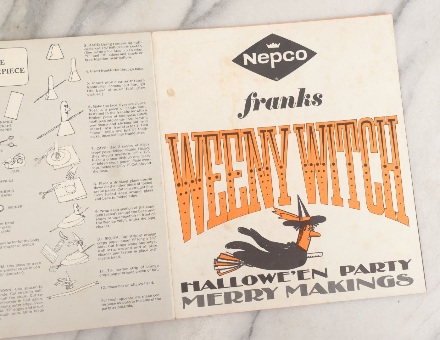 Lot 068 - Vintage "Franks Weeny Witch Hallowe'en Party Merry Makings" Fold Out Pin-The-Broom-On-The-Witch Poster And Halloween Party "Tricks And Treats Menu" With Recipes Including Brooms By Nepco