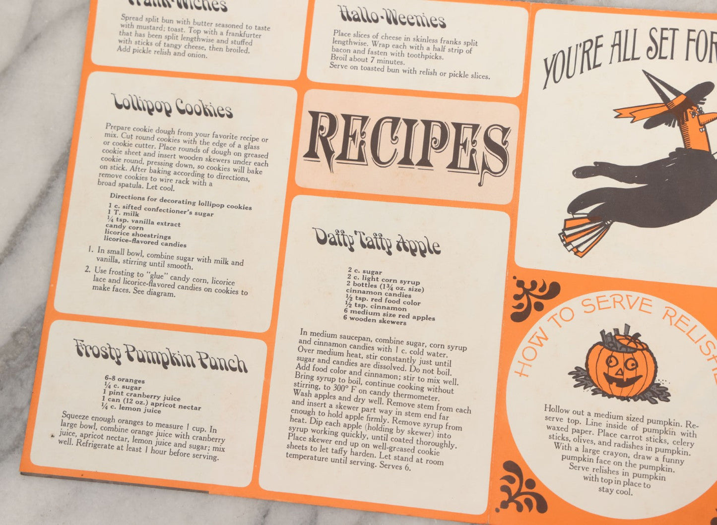 Lot 068 - Vintage "Franks Weeny Witch Hallowe'en Party Merry Makings" Fold Out Pin-The-Broom-On-The-Witch Poster And Halloween Party "Tricks And Treats Menu" With Recipes Including Brooms By Nepco