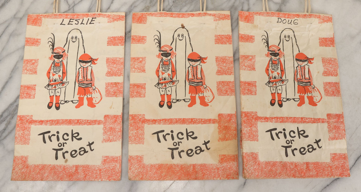 Lot 070 - Grouping Of Three "Trick Or Treat" Halloween Paper Bags With Ghost, Children In Costumes With Names Written In Sharpie Made By Duro Paper Bag Manufacturing Co., Ludlow, Kentucky, Trick Or Treat Design No. 6X