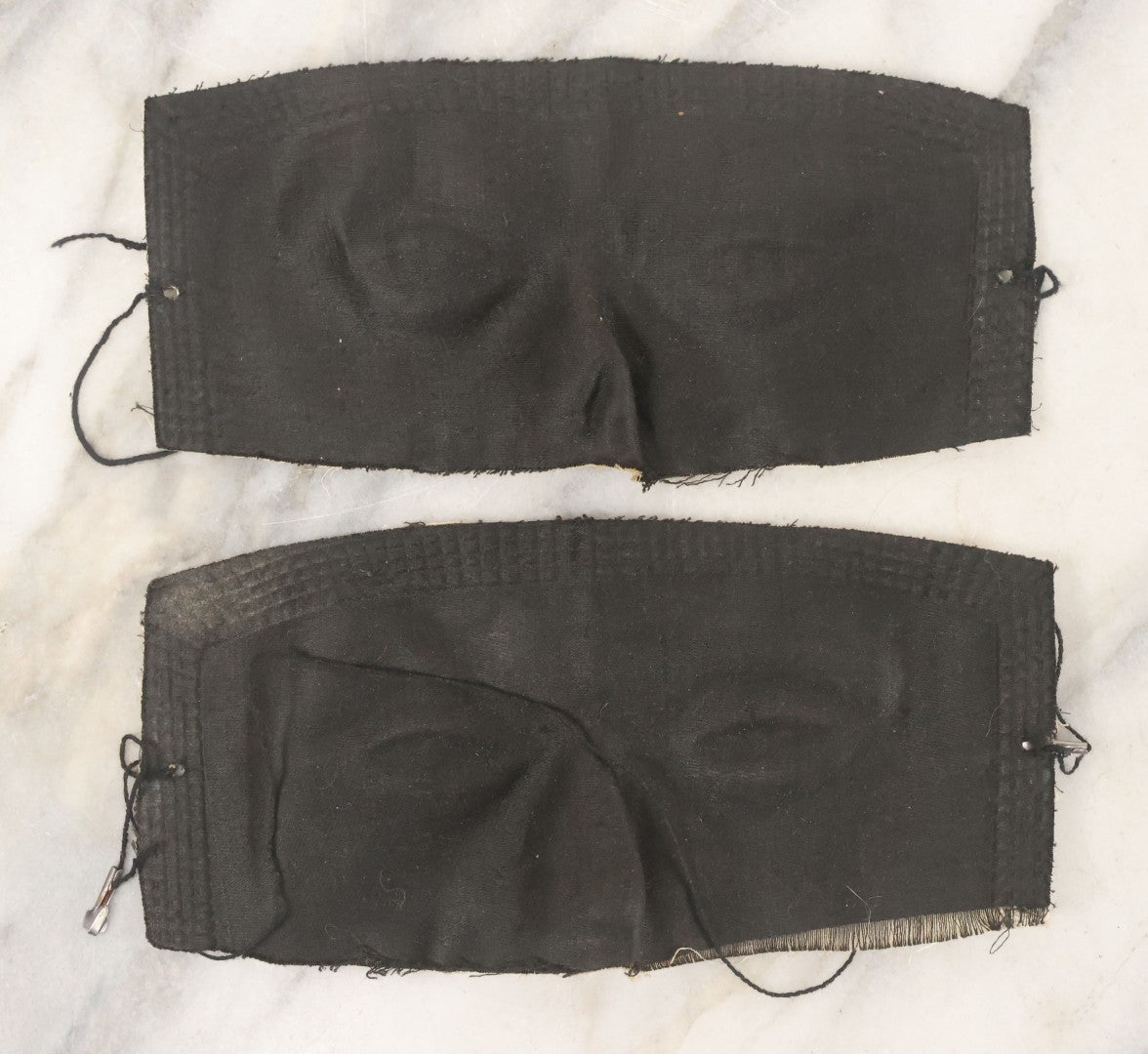 Lot 076 - Pair Of Antique Black Fabric Masks With Molded Eyes And Noses
