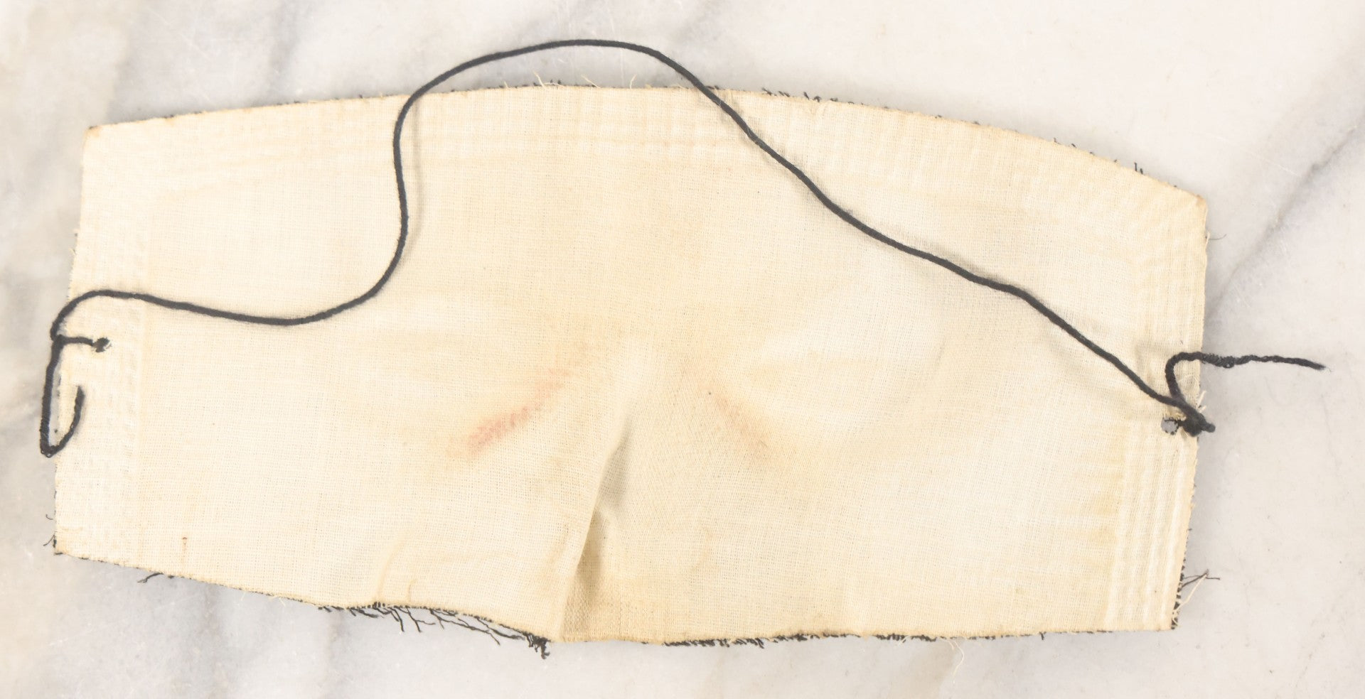 Lot 076 - Pair Of Antique Black Fabric Masks With Molded Eyes And Noses