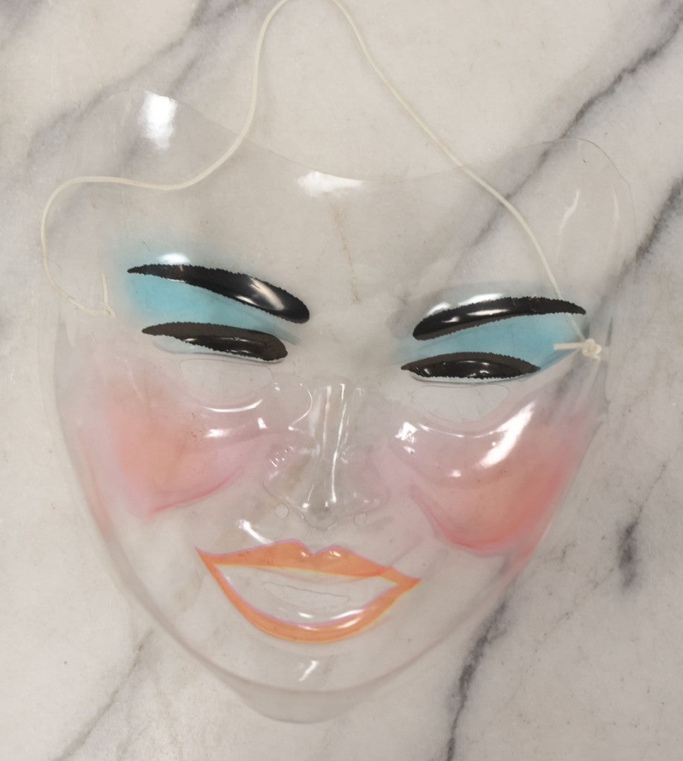 Lot 077 - Pair Of Vintage Clear Plastic Halloween Face Masks With Red Lips Black Eyebrows