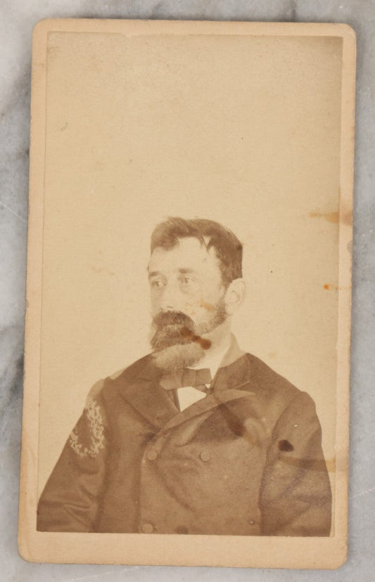 Lot 001 - Antique Carte De Visite C.D.V. Spirit Photograph Taken By William Mumler Of Dr. J.E. Parsons, With Faint Spirit Of Woman Embracing Subject, Back Marked "Specialty By Mumler. 170 West Springfield St., Boston, Mass" Note Foxing, Wear, Markings