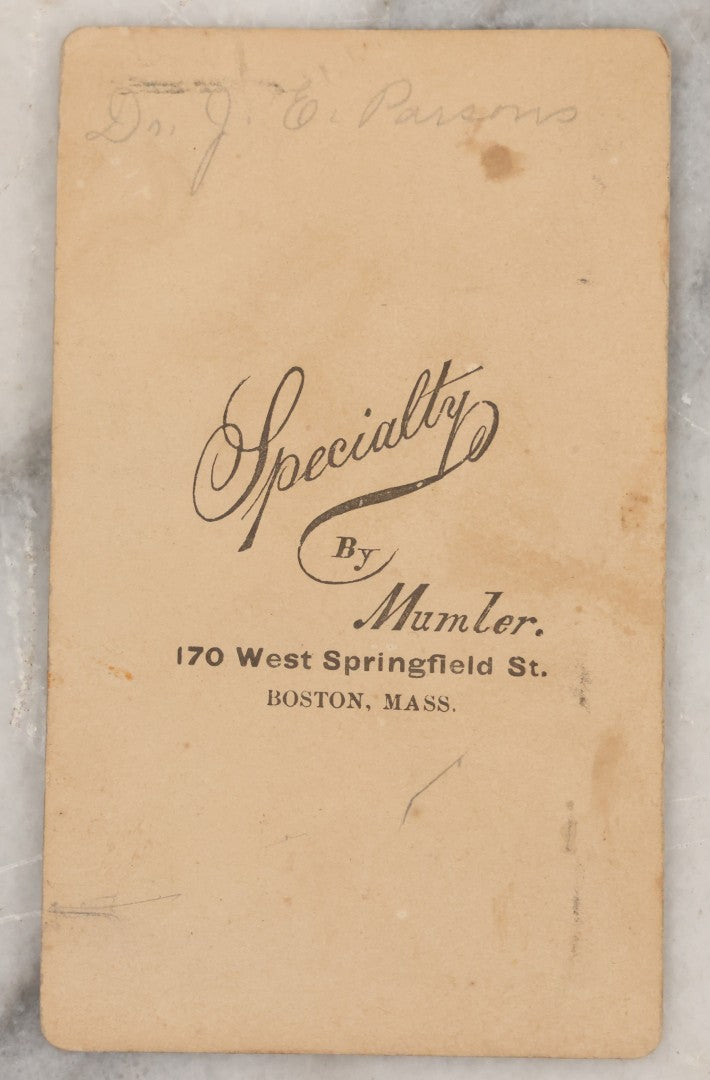 Lot 001 - Antique Carte De Visite C.D.V. Spirit Photograph Taken By William Mumler Of Dr. J.E. Parsons, With Faint Spirit Of Woman Embracing Subject, Back Marked "Specialty By Mumler. 170 West Springfield St., Boston, Mass" Note Foxing, Wear, Markings