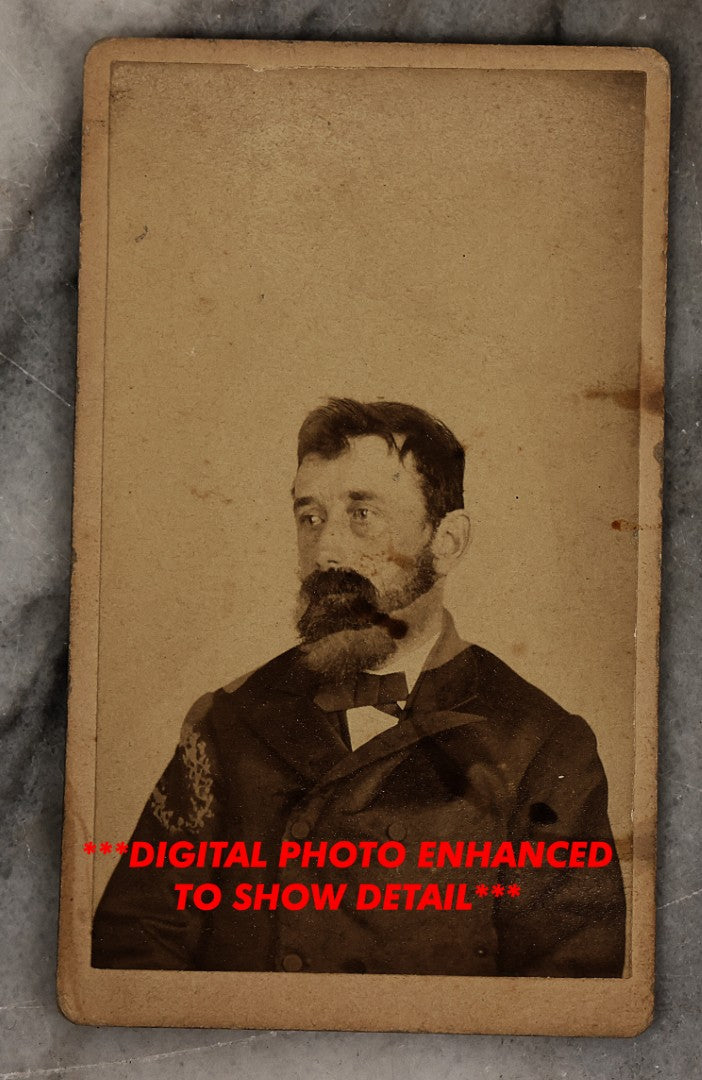 Lot 001 - Antique Carte De Visite C.D.V. Spirit Photograph Taken By William Mumler Of Dr. J.E. Parsons, With Faint Spirit Of Woman Embracing Subject, Back Marked "Specialty By Mumler. 170 West Springfield St., Boston, Mass" Note Foxing, Wear, Markings