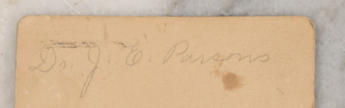 Lot 001 - Antique Carte De Visite C.D.V. Spirit Photograph Taken By William Mumler Of Dr. J.E. Parsons, With Faint Spirit Of Woman Embracing Subject, Back Marked "Specialty By Mumler. 170 West Springfield St., Boston, Mass" Note Foxing, Wear, Markings