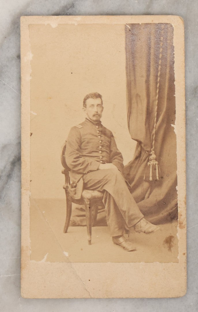 Lot 001 - Antique Carte De Visite C.D.V. Spirit Photograph Taken By William Mumler Of Dr. J.E. Parsons, With Faint Spirit Of Woman Embracing Subject, Back Marked "Specialty By Mumler. 170 West Springfield St., Boston, Mass" Note Foxing, Wear, Markings