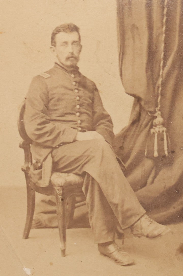 Lot 001 - Antique Carte De Visite C.D.V. Spirit Photograph Taken By William Mumler Of Dr. J.E. Parsons, With Faint Spirit Of Woman Embracing Subject, Back Marked "Specialty By Mumler. 170 West Springfield St., Boston, Mass" Note Foxing, Wear, Markings