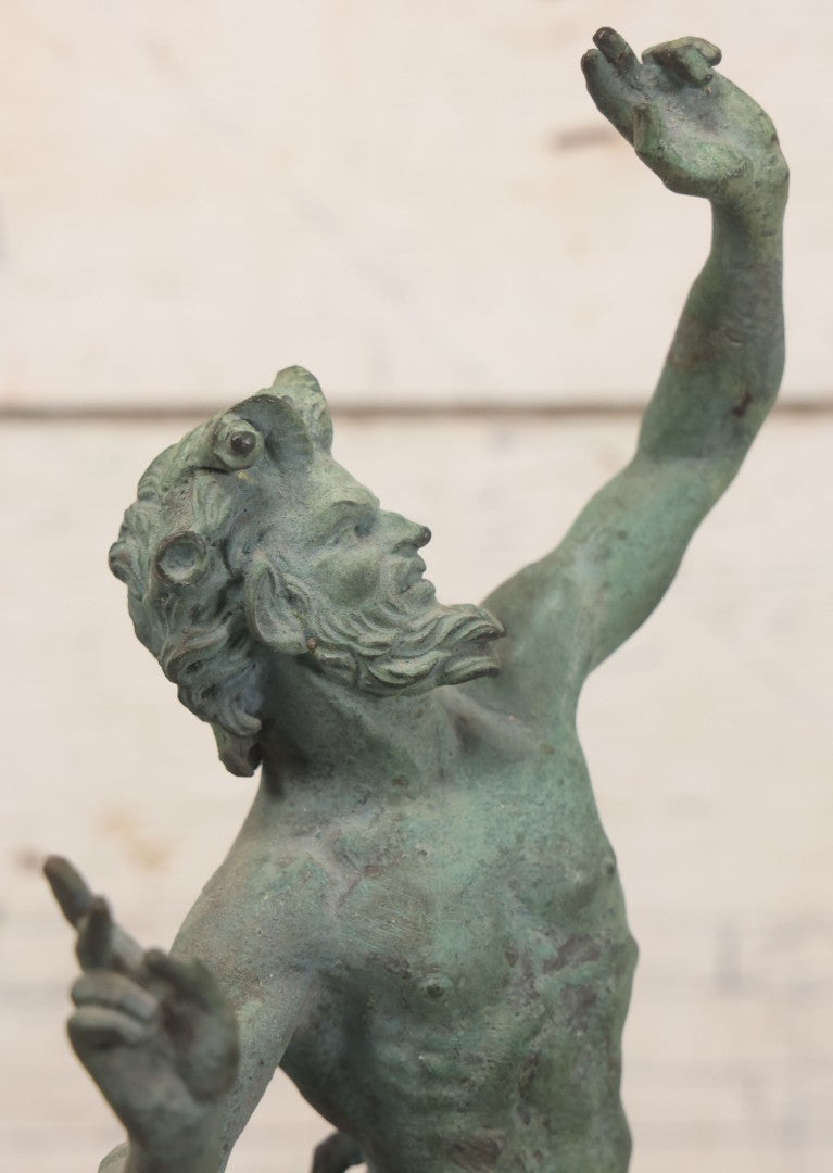 Lot 007 - Antique Cast Metal Nude Mythological Pan Statue In Victory Triumph Pose With Tail, Horns, Green Patina, 12-1/4" Height
