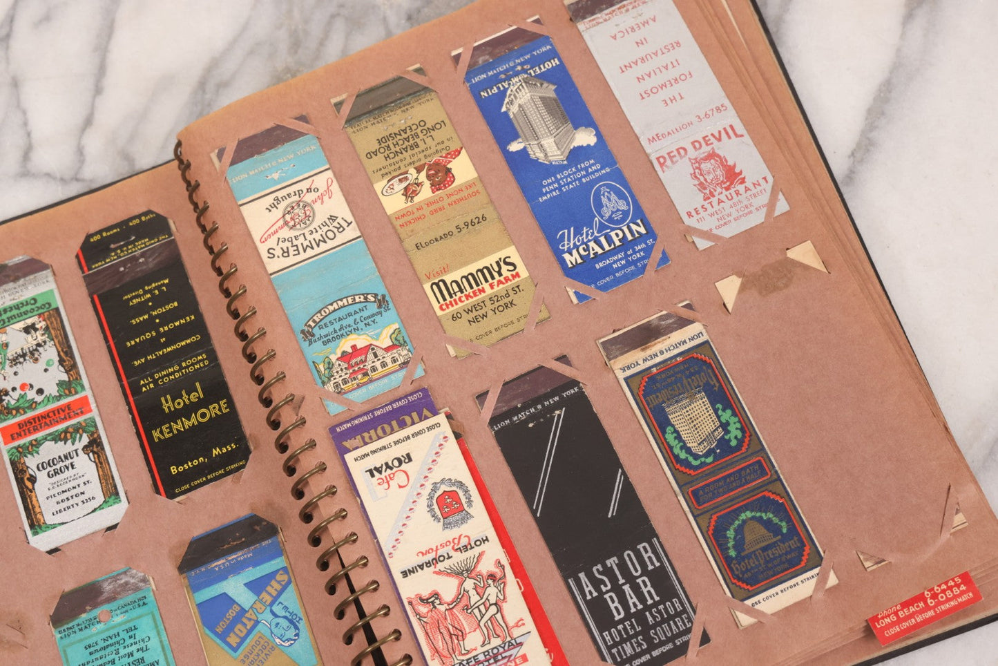 Lot 009 - Vintage Matchbook Cover Collection In "Twin Slit" Album With 100+ Match Book Covers Including Cocoanut Grove Nightclub, Location Of Deadly Fire In Boston, Red Devil Restaurant, New York, Many Others Clubs And Restaurants, Pinups, And More