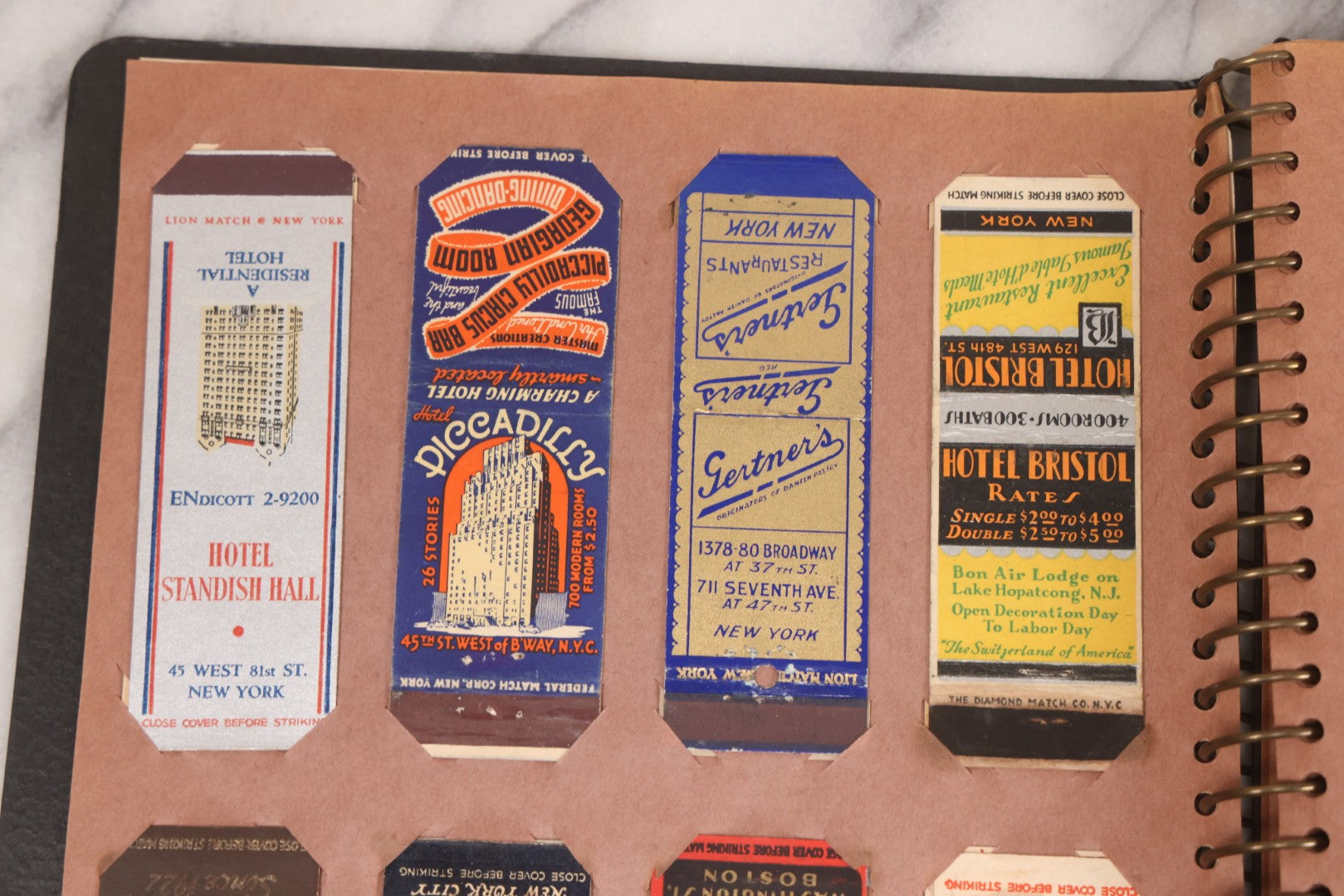 Lot 009 - Vintage Matchbook Cover Collection In "Twin Slit" Album With 100+ Match Book Covers Including Cocoanut Grove Nightclub, Location Of Deadly Fire In Boston, Red Devil Restaurant, New York, Many Others Clubs And Restaurants, Pinups, And More