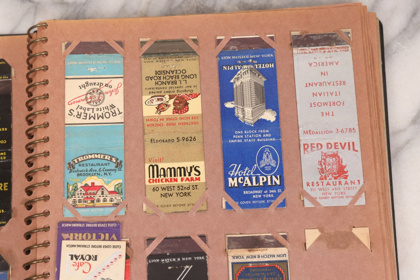 Lot 009 - Vintage Matchbook Cover Collection In "Twin Slit" Album With 100+ Match Book Covers Including Cocoanut Grove Nightclub, Location Of Deadly Fire In Boston, Red Devil Restaurant, New York, Many Others Clubs And Restaurants, Pinups, And More