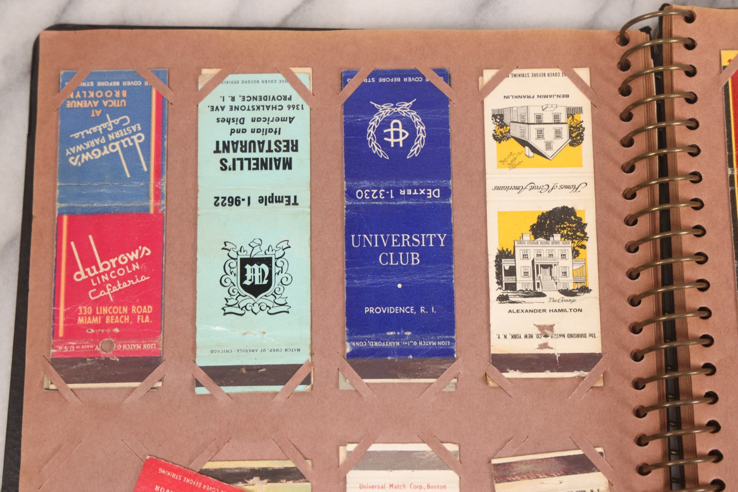 Lot 009 - Vintage Matchbook Cover Collection In "Twin Slit" Album With 100+ Match Book Covers Including Cocoanut Grove Nightclub, Location Of Deadly Fire In Boston, Red Devil Restaurant, New York, Many Others Clubs And Restaurants, Pinups, And More