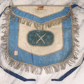 Lot 010 - Antique Odd Fellows I.O.O.F. Fraternal Apron With Embroidered Crossed Swords And Hand Painted All-Seeing-Eye Motifs, Silver Toned Fringe, Blue Coloring