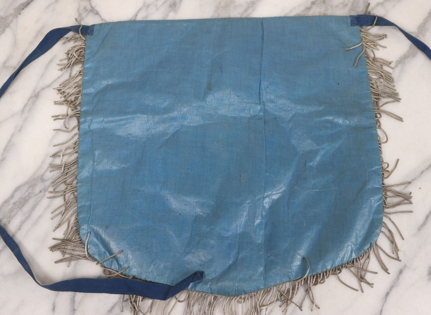 Lot 010 - Antique Odd Fellows I.O.O.F. Fraternal Apron With Embroidered Crossed Swords And Hand Painted All-Seeing-Eye Motifs, Silver Toned Fringe, Blue Coloring