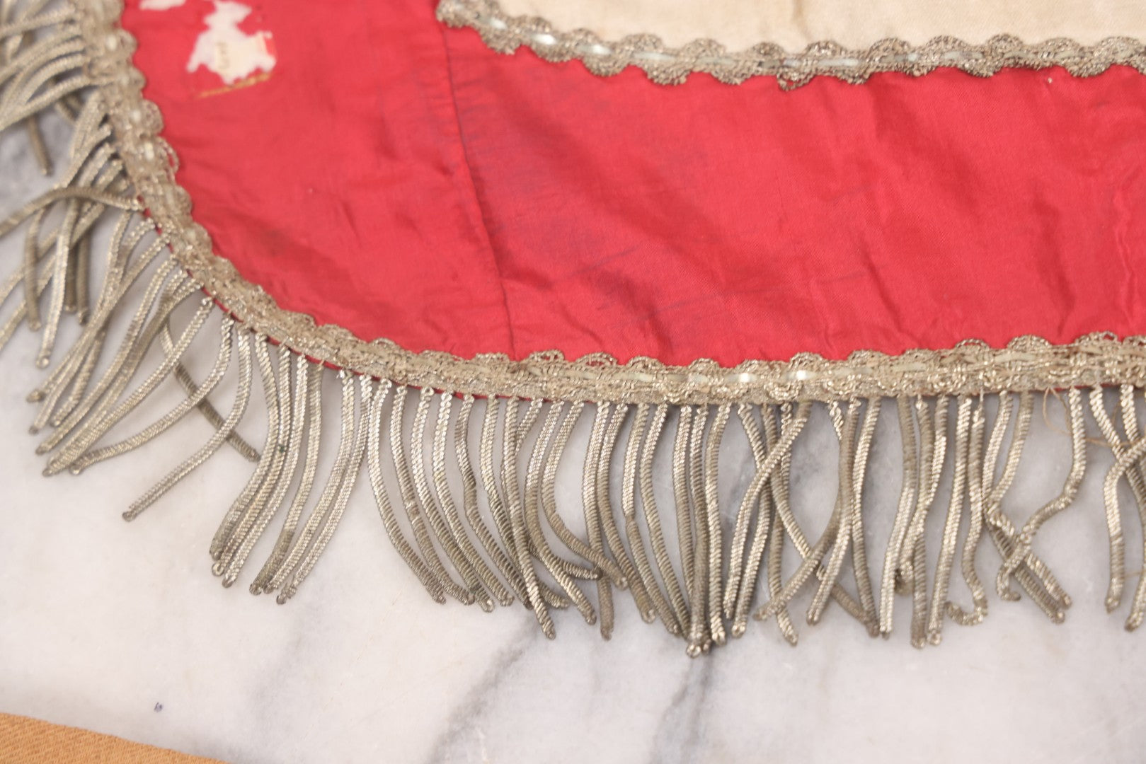 Lot 011 - Antique Odd Fellows I.O.O.F. Fraternal Apron With Embroidered Crossed Swords And Hand Painted All-Seeing-Eye Motifs, Silver Toned Fringe, Red Coloring