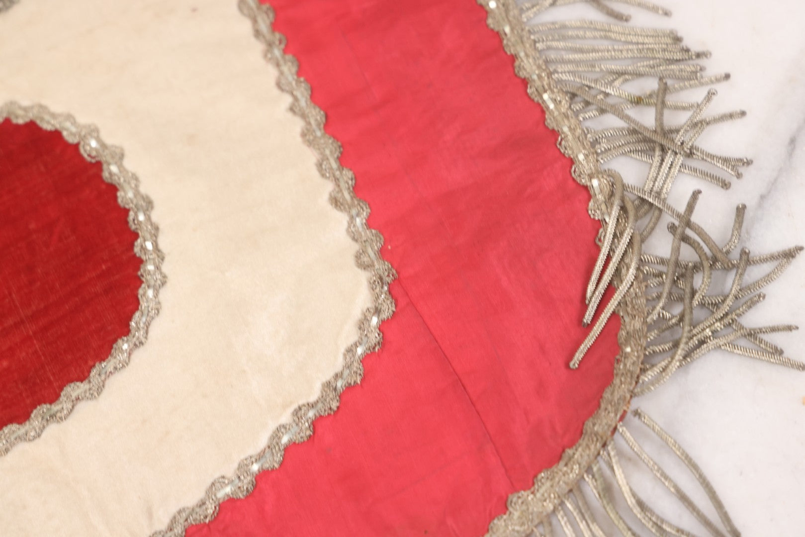 Lot 011 - Antique Odd Fellows I.O.O.F. Fraternal Apron With Embroidered Crossed Swords And Hand Painted All-Seeing-Eye Motifs, Silver Toned Fringe, Red Coloring