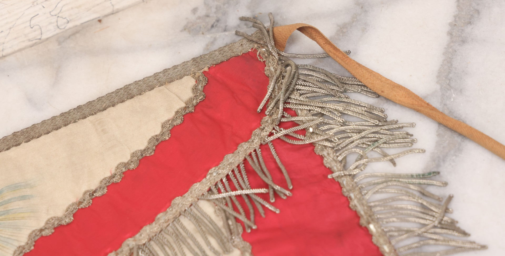 Lot 011 - Antique Odd Fellows I.O.O.F. Fraternal Apron With Embroidered Crossed Swords And Hand Painted All-Seeing-Eye Motifs, Silver Toned Fringe, Red Coloring