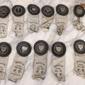 Lot 013 - Grouping Of 15+ Antique Knights Of Pythias Fraternal Badges And Ribbons With Black Coloring, White Ribbons With Black Veil Covering, Pressed Metal Insignia, Myrtle Lodge No. 19, K.P., Kennebunk, Maine