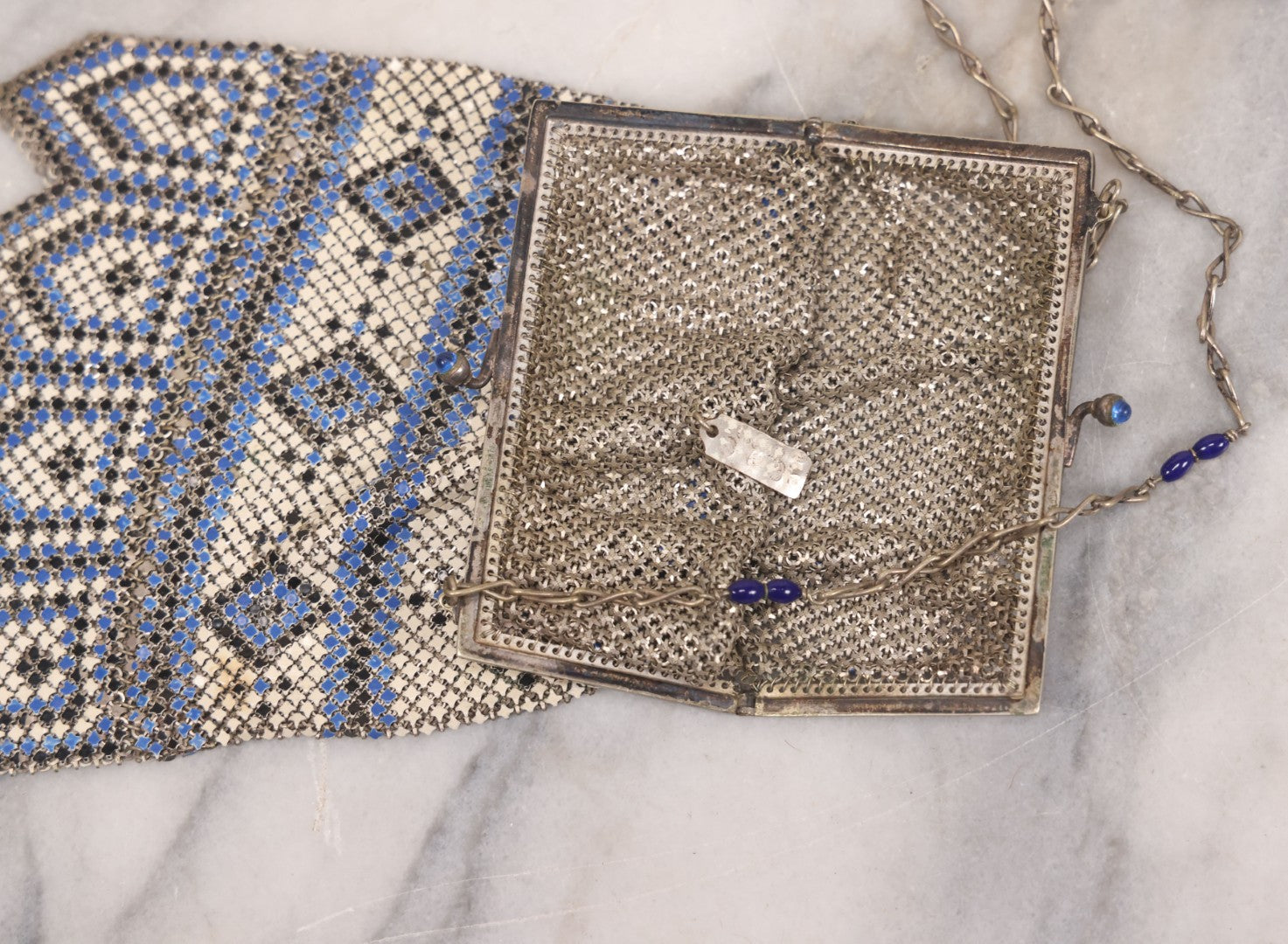 Lot 016 - Antique Enameled Metal Mesh Flapper Purse With Blue, Black, And White Coloring, Geometric Pattern, Manufactured By Whiting And Davis Co., Circa 1920s