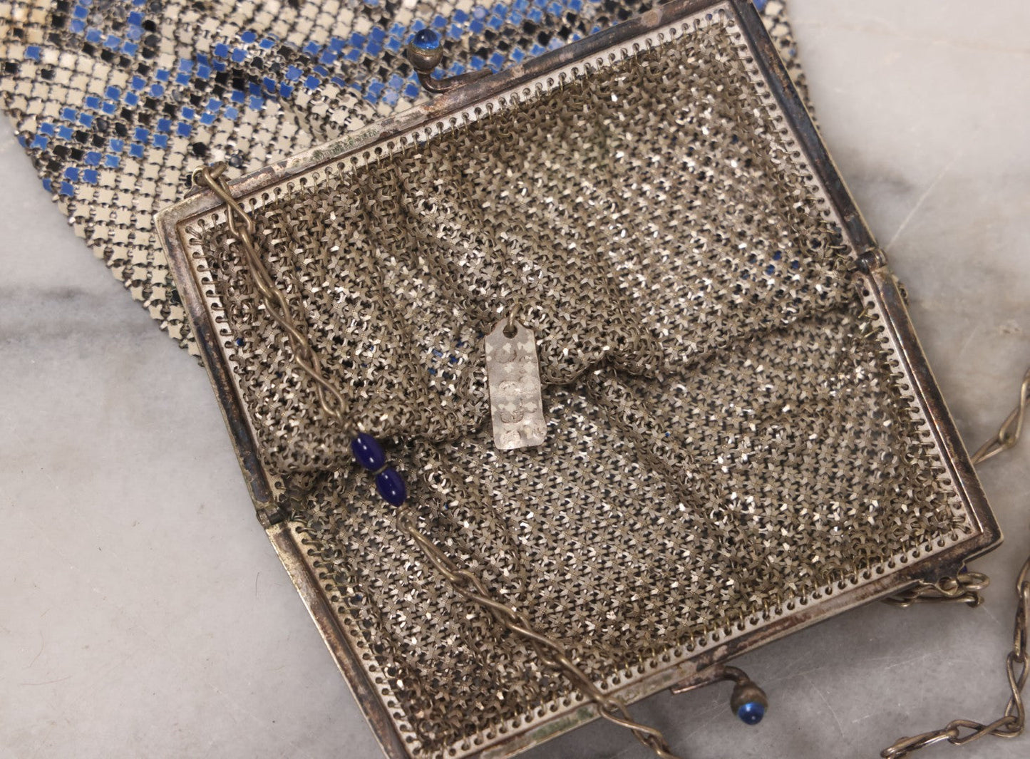 Lot 016 - Antique Enameled Metal Mesh Flapper Purse With Blue, Black, And White Coloring, Geometric Pattern, Manufactured By Whiting And Davis Co., Circa 1920s