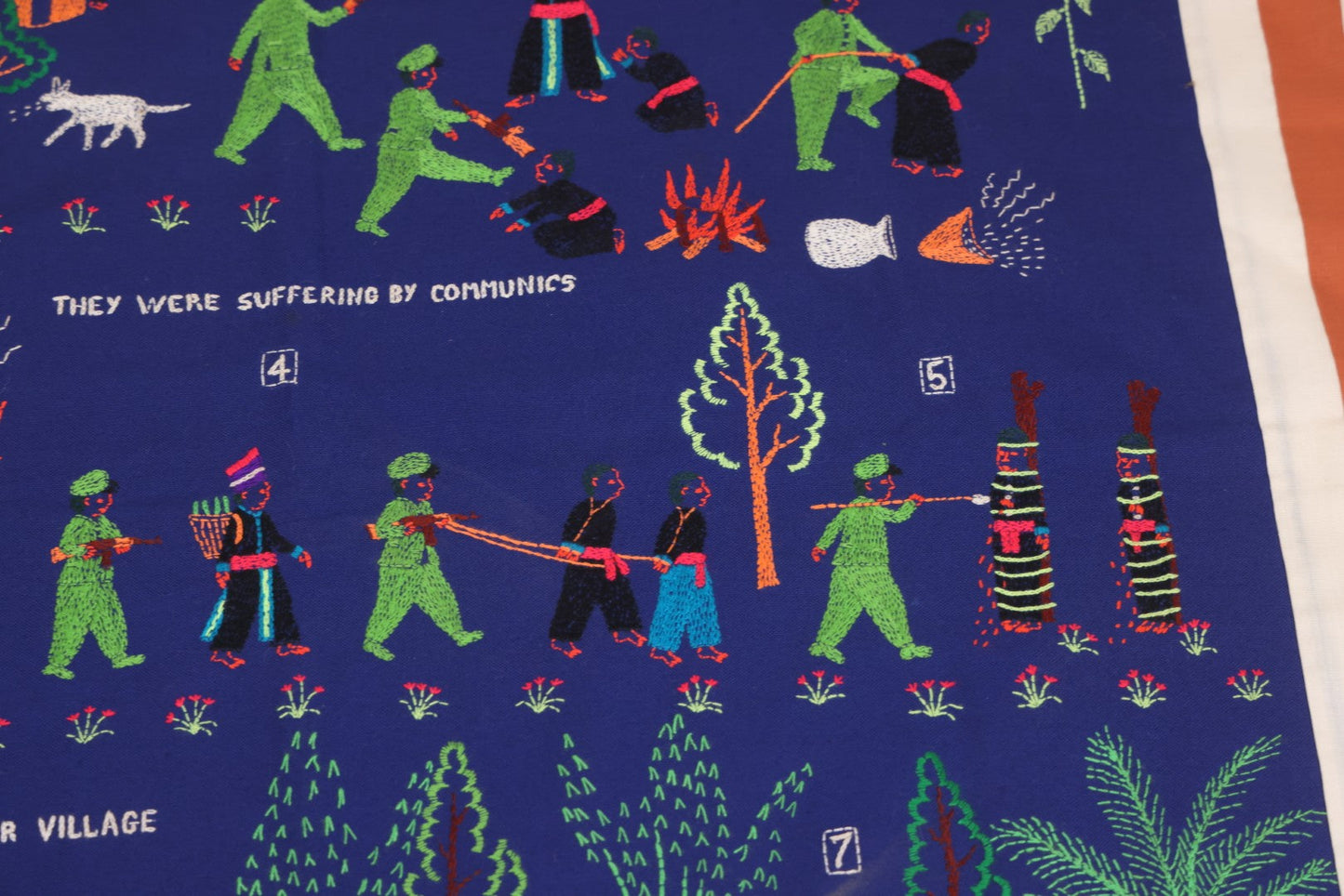 Lot 017 - Pair Of Vintage Folk Art Embroidered Hmong Story Cloths (Paj Ntaub) Illustrating "The War In Laos Since 1976" Across 13 Scenes, Artist Signed Mee Xiong, With Gallery Label From Cama Crafts, Made In Thailand, Circa 1990s