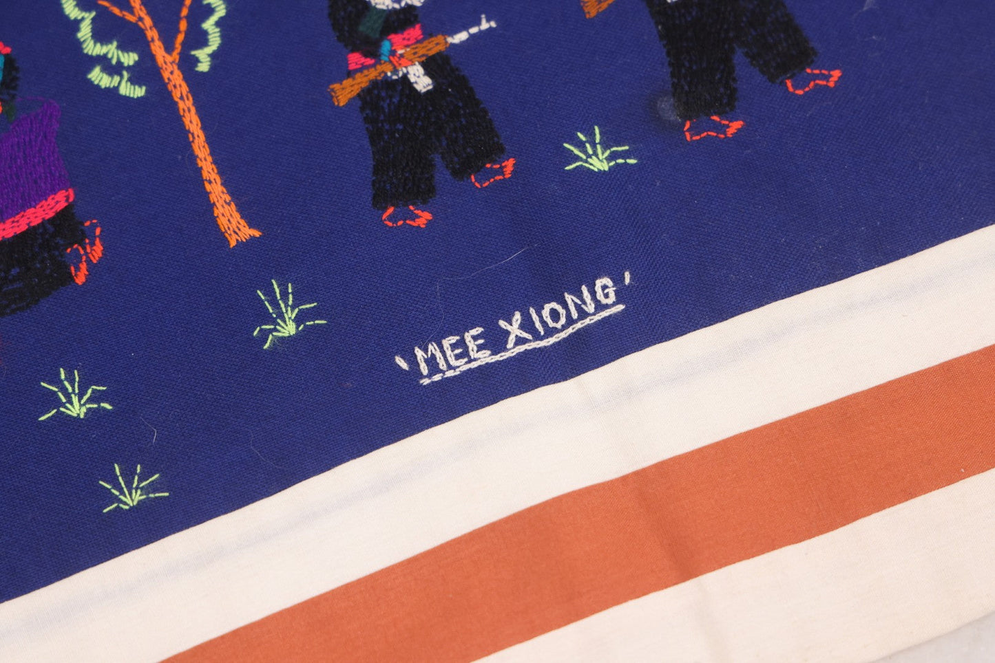 Lot 017 - Pair Of Vintage Folk Art Embroidered Hmong Story Cloths (Paj Ntaub) Illustrating "The War In Laos Since 1976" Across 13 Scenes, Artist Signed Mee Xiong, With Gallery Label From Cama Crafts, Made In Thailand, Circa 1990s