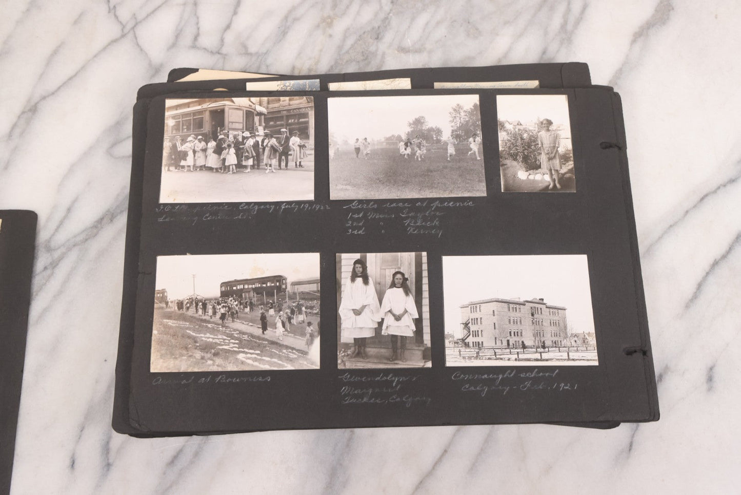 Lot 021 - Antique Snapshot Photo Album Containing 250+ Photographs Including Many Photos Of British Columbia, Railroad Accident, Bears And Bear Hunting, Animals, Cars, And Children, Circa 1905-1920, Note Pages Loose, No Covers