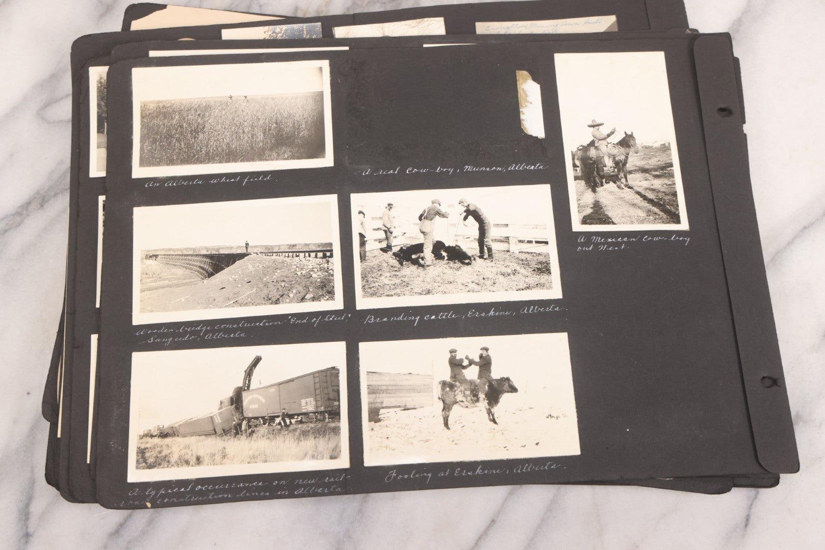 Lot 021 - Antique Snapshot Photo Album Containing 250+ Photographs Including Many Photos Of British Columbia, Railroad Accident, Bears And Bear Hunting, Animals, Cars, And Children, Circa 1905-1920, Note Pages Loose, No Covers