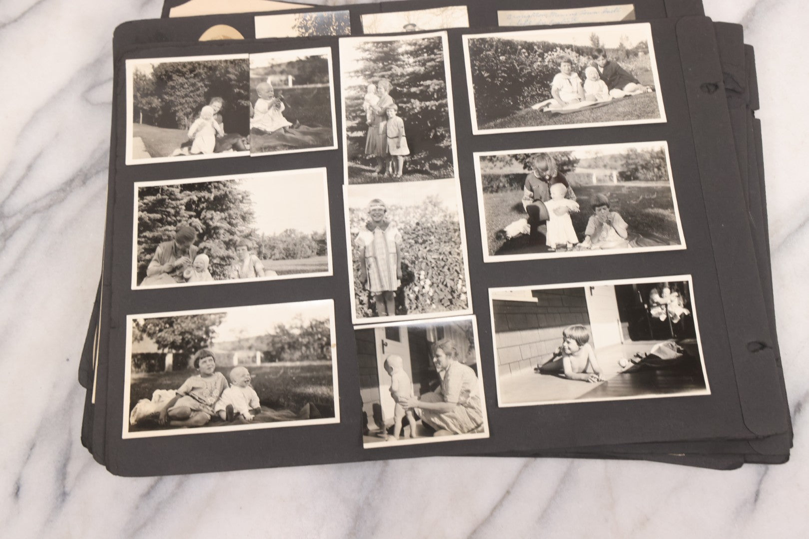 Lot 021 - Antique Snapshot Photo Album Containing 250+ Photographs Including Many Photos Of British Columbia, Railroad Accident, Bears And Bear Hunting, Animals, Cars, And Children, Circa 1905-1920, Note Pages Loose, No Covers