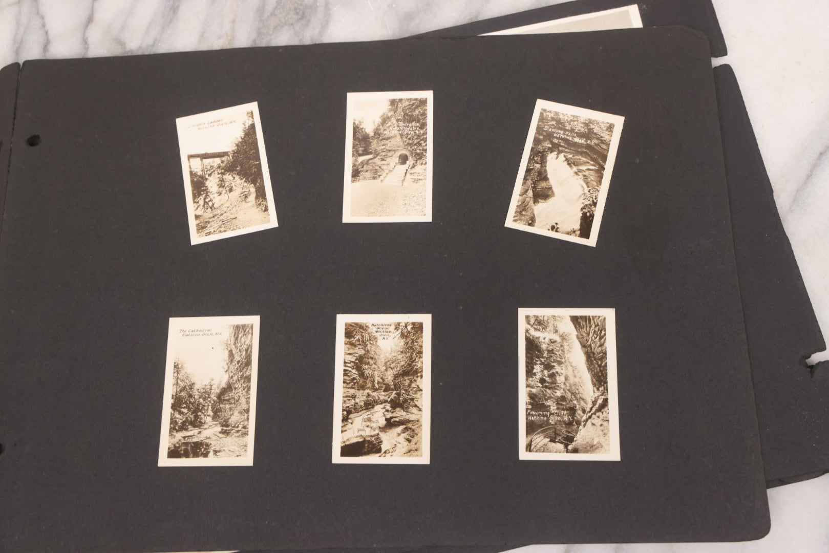 Lot 021 - Antique Snapshot Photo Album Containing 250+ Photographs Including Many Photos Of British Columbia, Railroad Accident, Bears And Bear Hunting, Animals, Cars, And Children, Circa 1905-1920, Note Pages Loose, No Covers