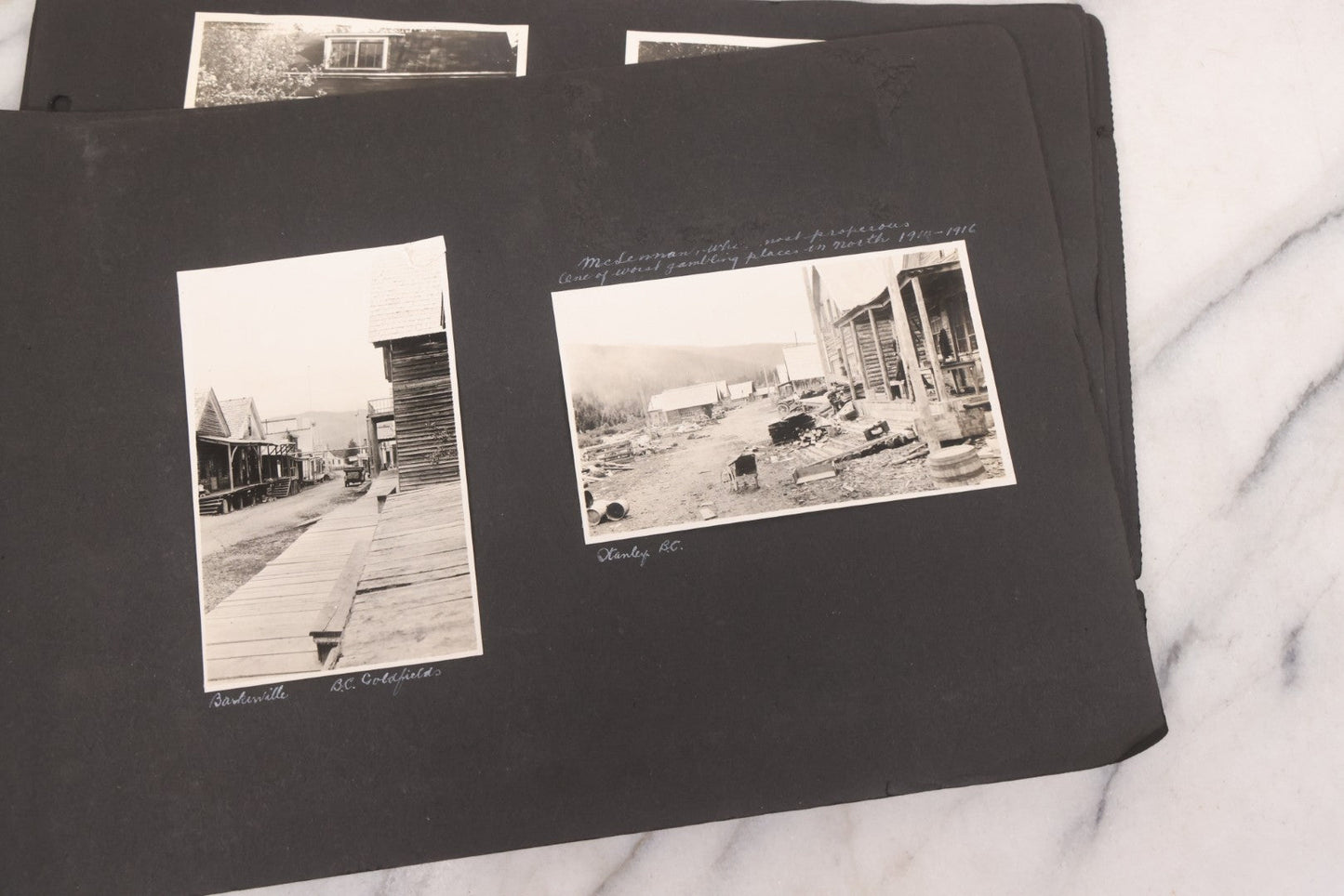 Lot 021 - Antique Snapshot Photo Album Containing 250+ Photographs Including Many Photos Of British Columbia, Railroad Accident, Bears And Bear Hunting, Animals, Cars, And Children, Circa 1905-1920, Note Pages Loose, No Covers