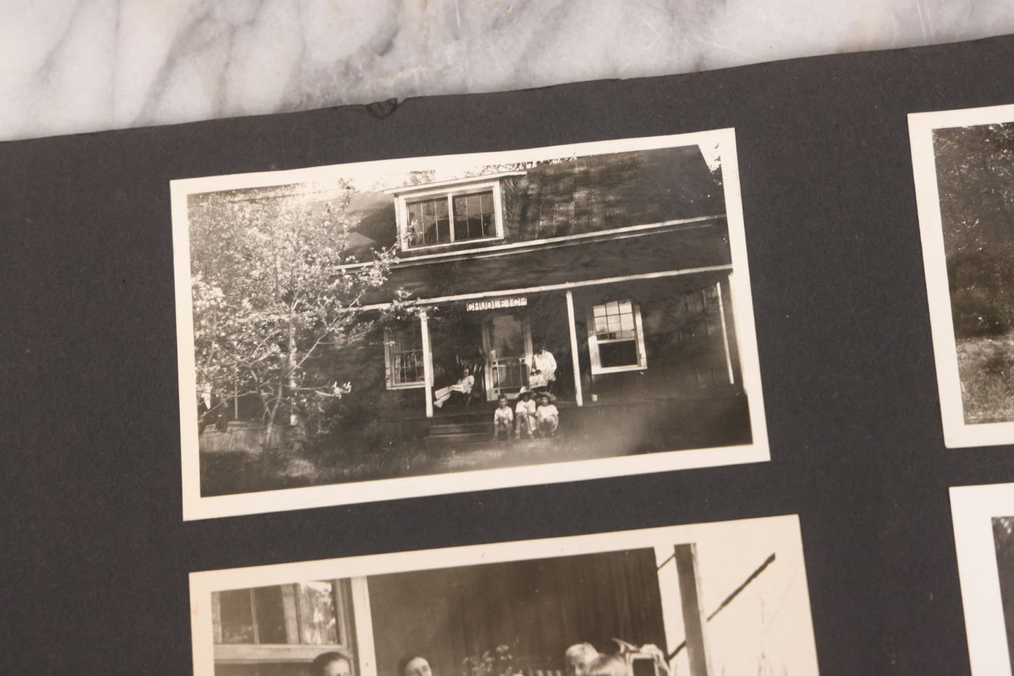 Lot 021 - Antique Snapshot Photo Album Containing 250+ Photographs Including Many Photos Of British Columbia, Railroad Accident, Bears And Bear Hunting, Animals, Cars, And Children, Circa 1905-1920, Note Pages Loose, No Covers