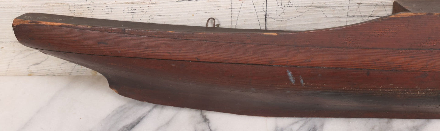 Lot 022 - Vintage Folk Art Wooden Ship Half-Hull Model Body Cross Section For Wall Display, Solid Wood Construction, Three Drilled Holes In Front Bow For Masts, Note Chipping And Cracks Throughout, 30" Length