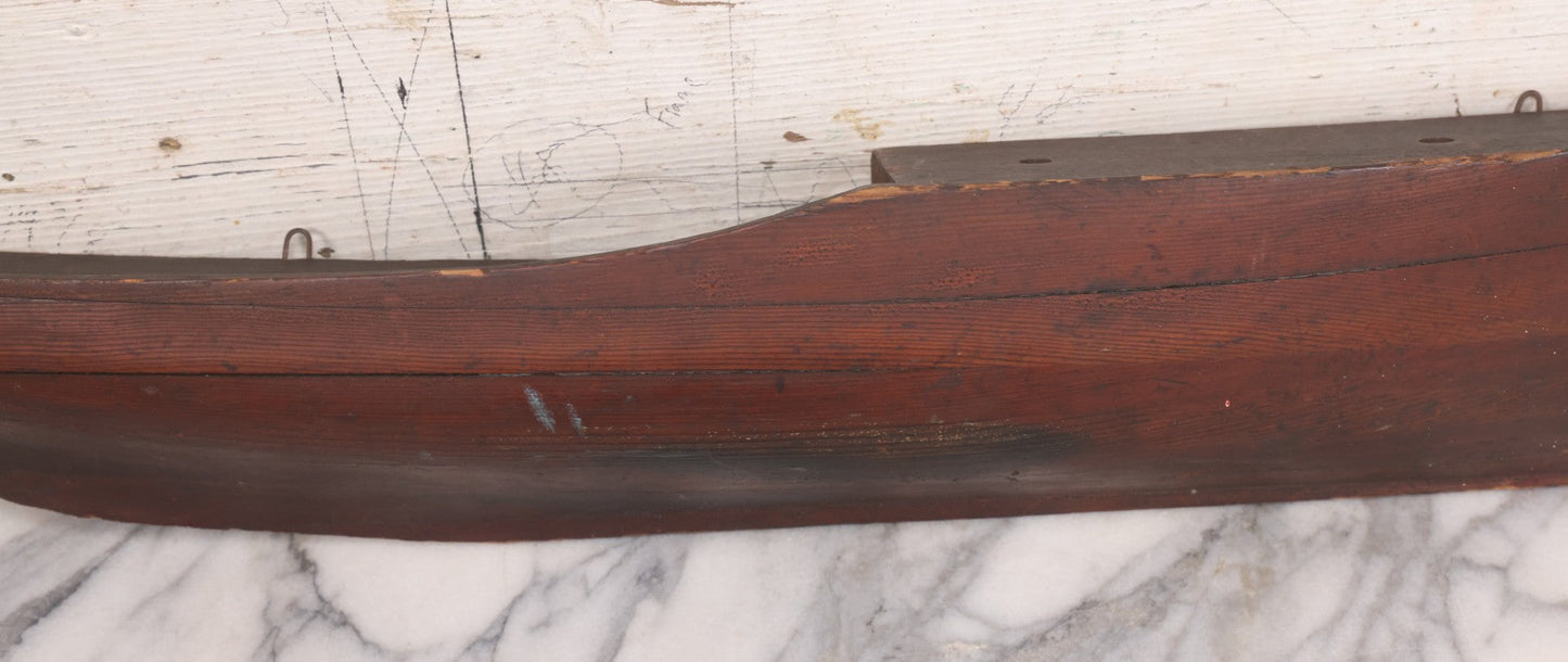 Lot 022 - Vintage Folk Art Wooden Ship Half-Hull Model Body Cross Section For Wall Display, Solid Wood Construction, Three Drilled Holes In Front Bow For Masts, Note Chipping And Cracks Throughout, 30" Length
