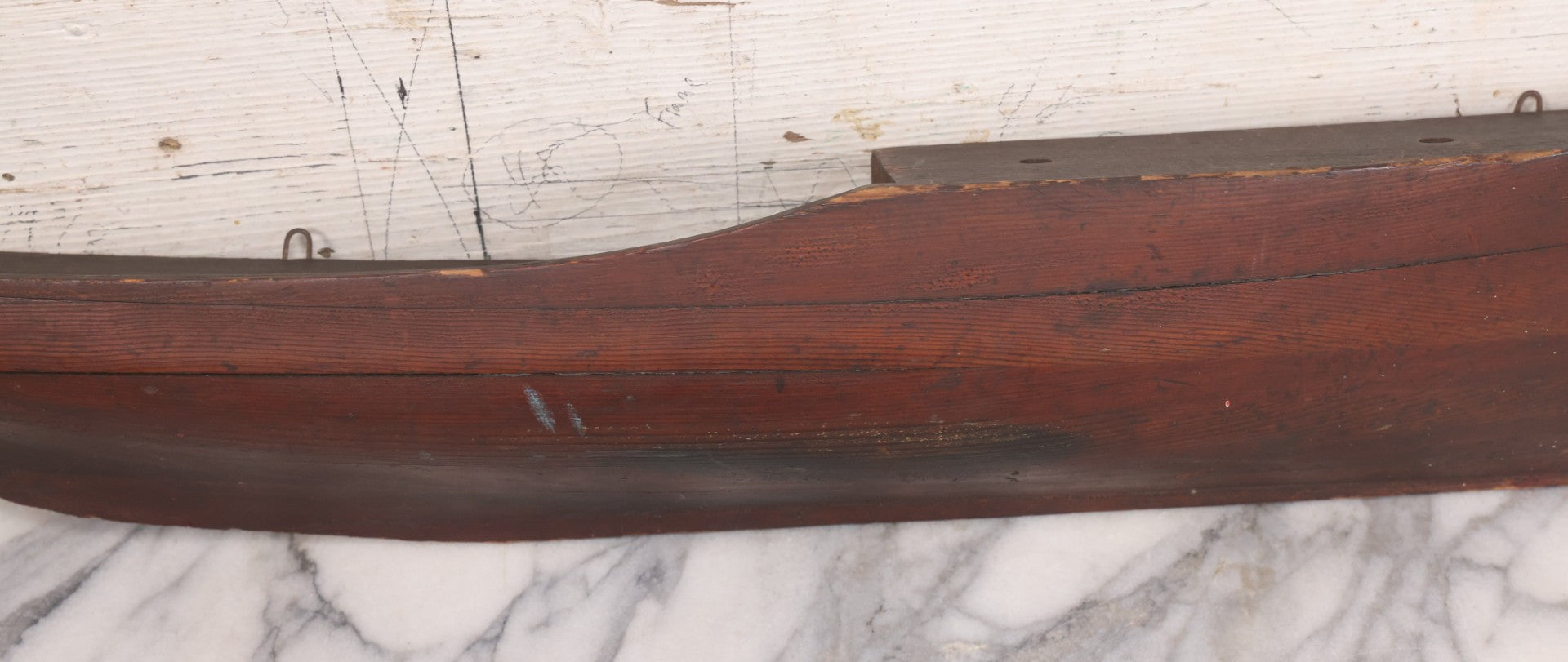 Lot 022 - Vintage Folk Art Wooden Ship Half-Hull Model Body Cross Section For Wall Display, Solid Wood Construction, Three Drilled Holes In Front Bow For Masts, Note Chipping And Cracks Throughout, 30" Length