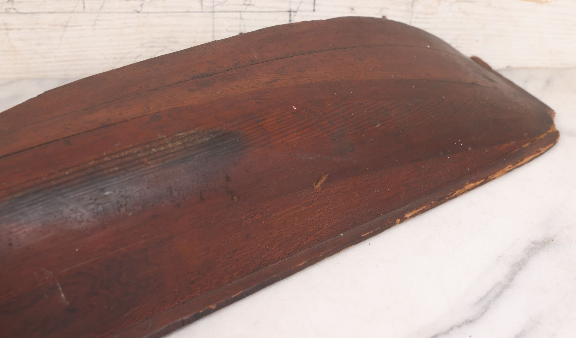 Lot 022 - Vintage Folk Art Wooden Ship Half-Hull Model Body Cross Section For Wall Display, Solid Wood Construction, Three Drilled Holes In Front Bow For Masts, Note Chipping And Cracks Throughout, 30" Length