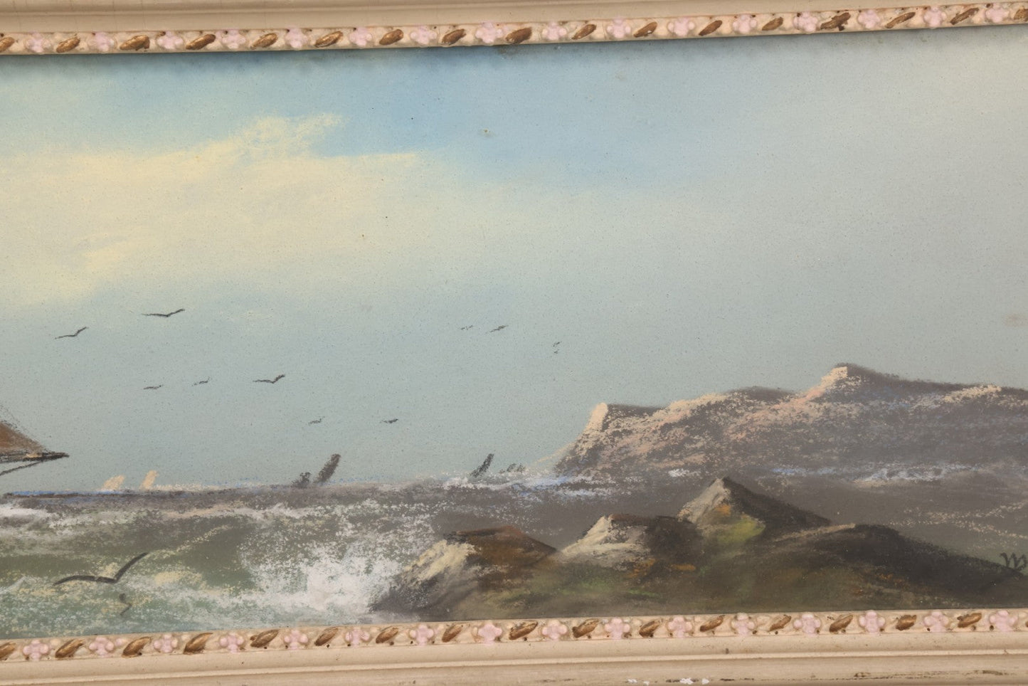 Lot 024 - Antique Nautical Pastel Painting Of A Sailing Ship On Choppy Waters, With Coastal Mountains, Other Ships In Background, Artist Signed M. Dulmy, In Original Painted Pressed Gesso Custom Frame, 23" x 9"