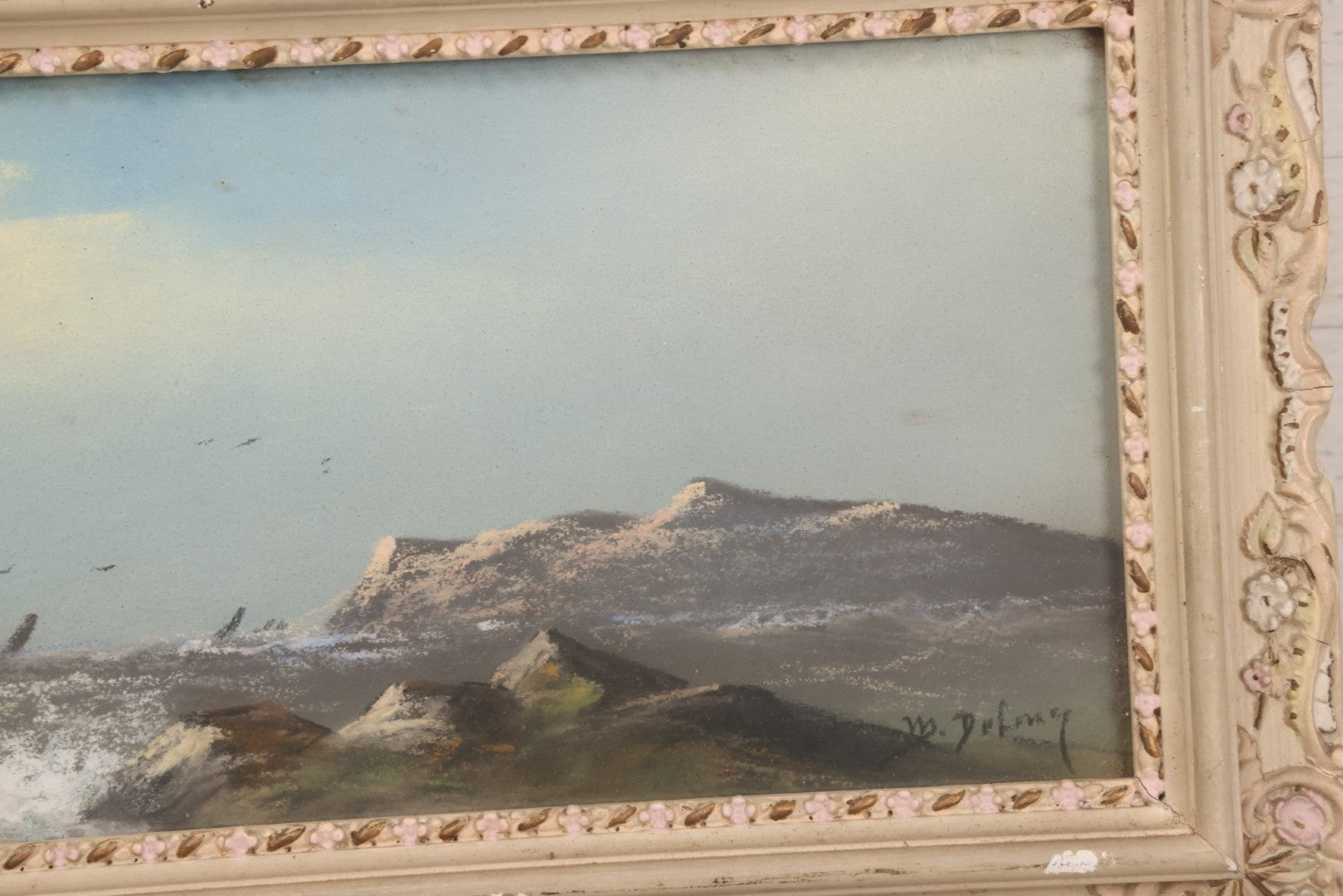 Lot 024 - Antique Nautical Pastel Painting Of A Sailing Ship On Choppy Waters, With Coastal Mountains, Other Ships In Background, Artist Signed M. Dulmy, In Original Painted Pressed Gesso Custom Frame, 23" x 9"