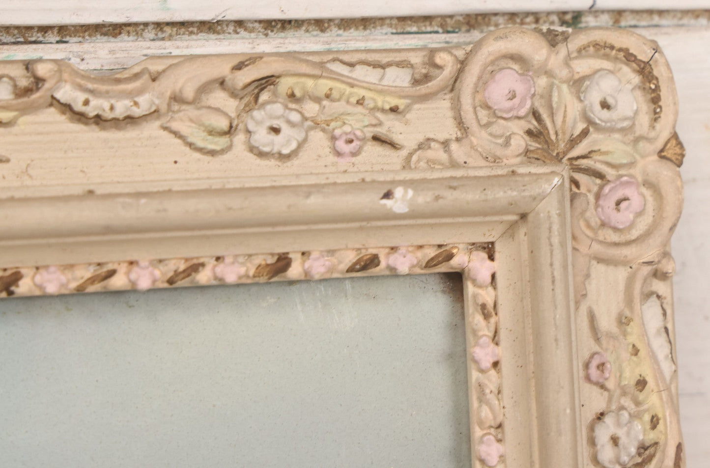 Lot 024 - Antique Nautical Pastel Painting Of A Sailing Ship On Choppy Waters, With Coastal Mountains, Other Ships In Background, Artist Signed M. Dulmy, In Original Painted Pressed Gesso Custom Frame, 23" x 9"