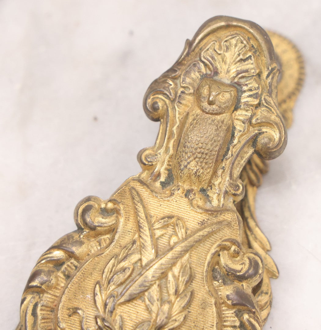 Lot 029 - Antique Victorian Pressed Brass Paperclip With Owl, Crossed Quills Motifs, Manufactured By W. Dowler, Birmingham, England, 4-7/8" Height
