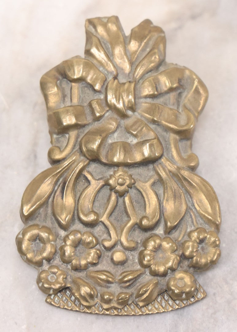Lot 030 - Antique Victorian Pressed Brass Paperclip With Bow And Flower Bouquet Motifs, Illegible Manufacturer's Mark, 3-3/8" Height