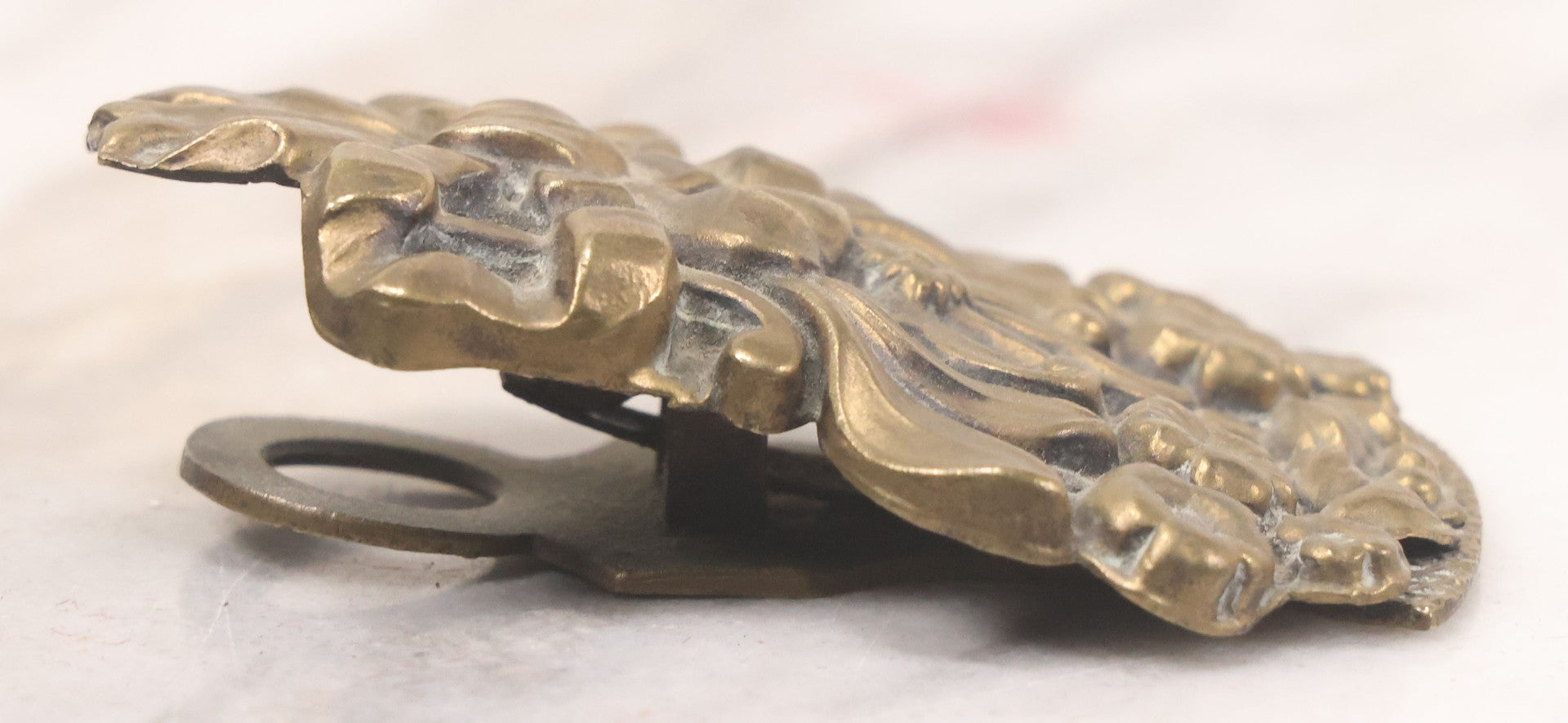 Lot 030 - Antique Victorian Pressed Brass Paperclip With Bow And Flower Bouquet Motifs, Illegible Manufacturer's Mark, 3-3/8" Height