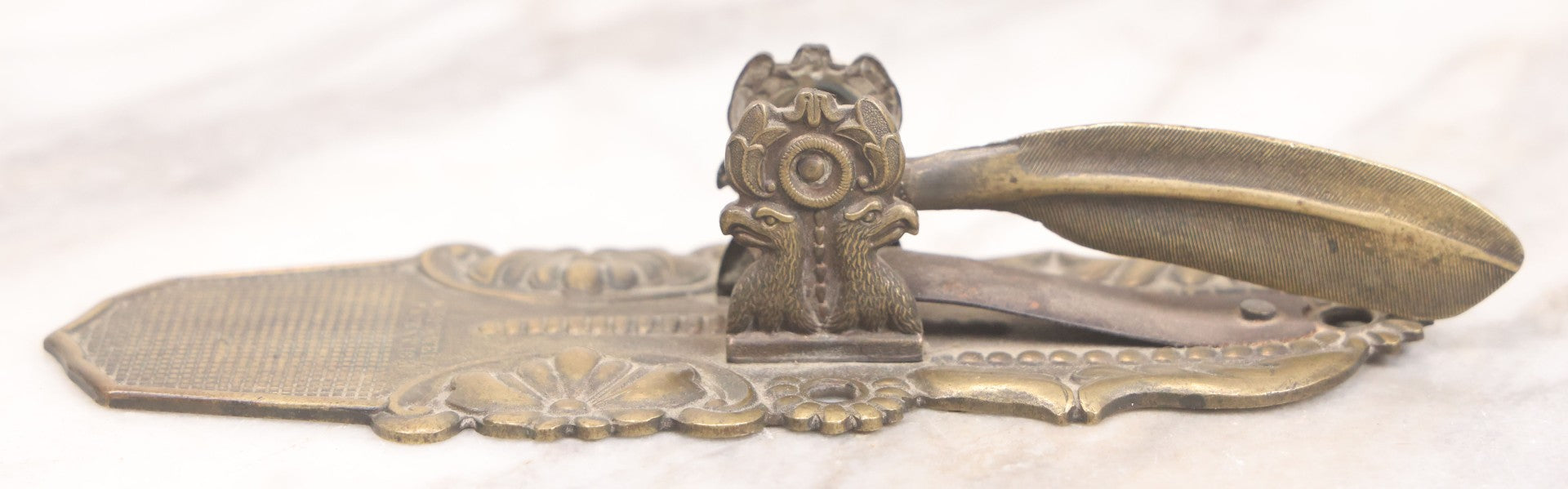 Lot 031 - Antique Victorian Pressed Brass Paperclip With Eagle And Feather Motifs, Manufactured By F.A. Rockwell, 1860, Note Damaged, Missing Hand Clip, 6" Length