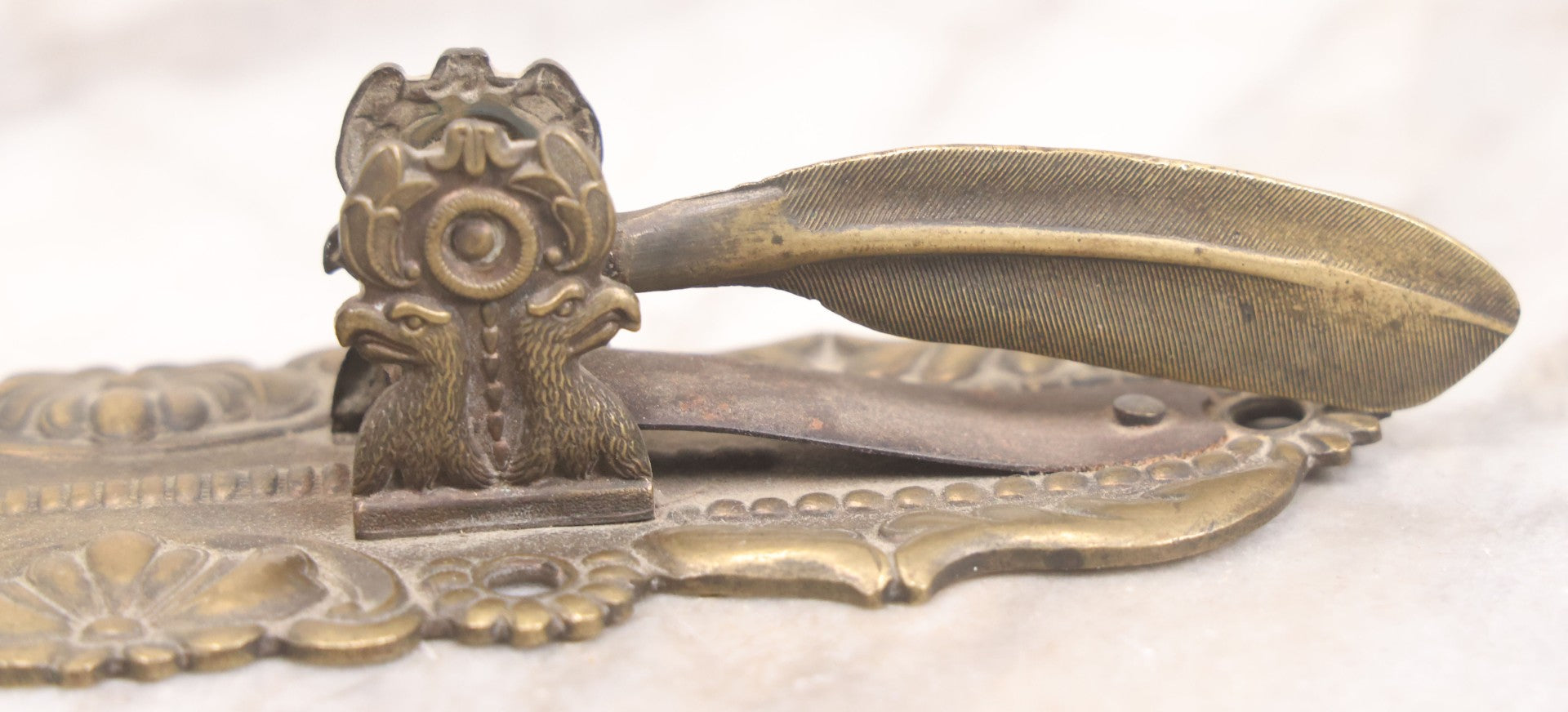 Lot 031 - Antique Victorian Pressed Brass Paperclip With Eagle And Feather Motifs, Manufactured By F.A. Rockwell, 1860, Note Damaged, Missing Hand Clip, 6" Length