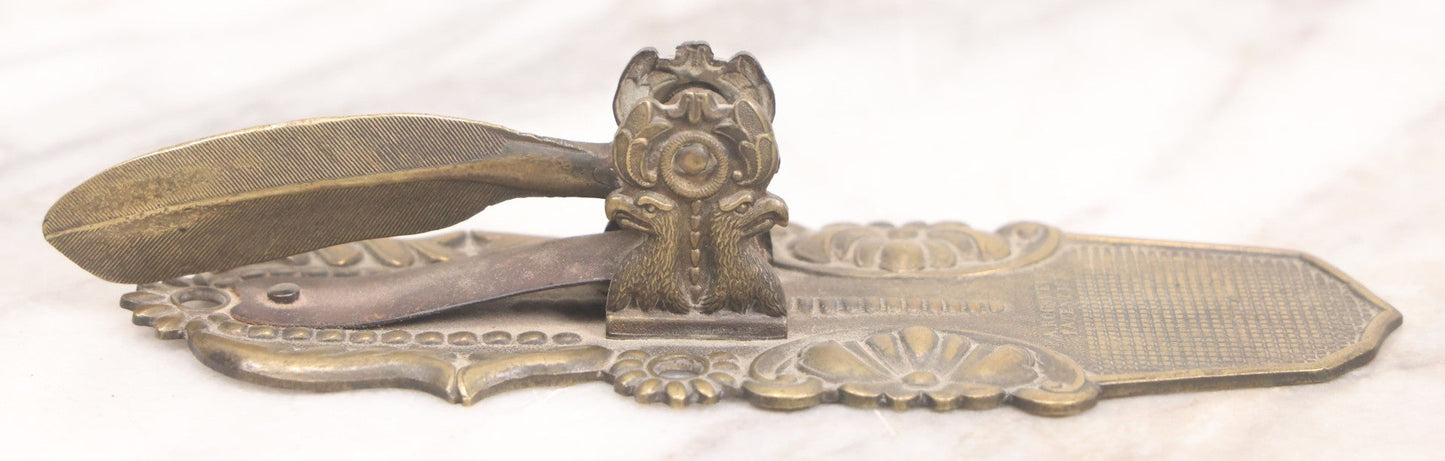 Lot 031 - Antique Victorian Pressed Brass Paperclip With Eagle And Feather Motifs, Manufactured By F.A. Rockwell, 1860, Note Damaged, Missing Hand Clip, 6" Length