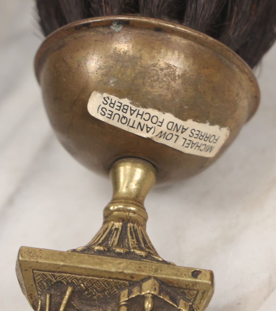 Lot 034 - Antique European Brass Ash Tray And Brush With Cat And The Fiddle Nursery Rhyme Theme Motif, Woman At Sewing Wheel, Bearing Labels From Michael Lowe Antiques, Forres And Fochabers, Scotland