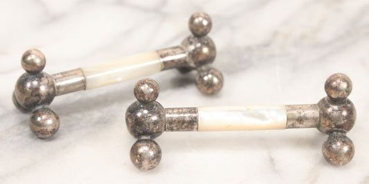 Lot 037 - Pair Of Antique Silverplate And Mother Of Pearl Knife Rests, 3-1/2" Long Each